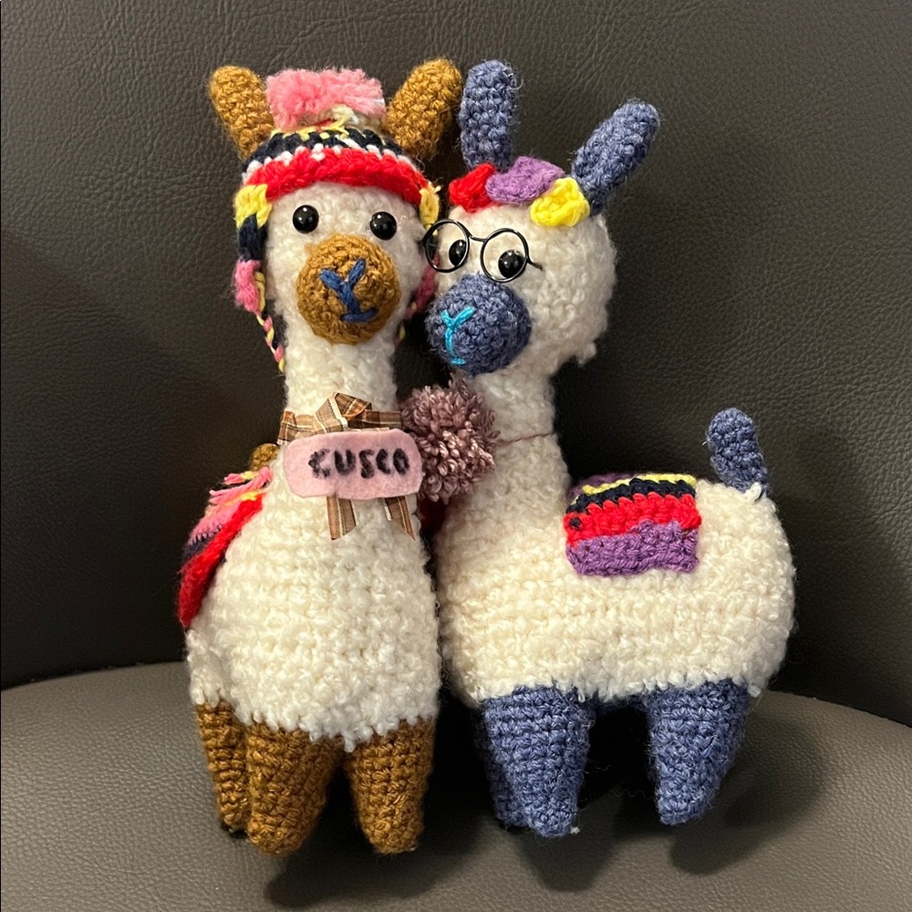 A pair of handknit Colorful Knitted Llama Plush Toys